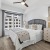 a bedroom with a large bed
